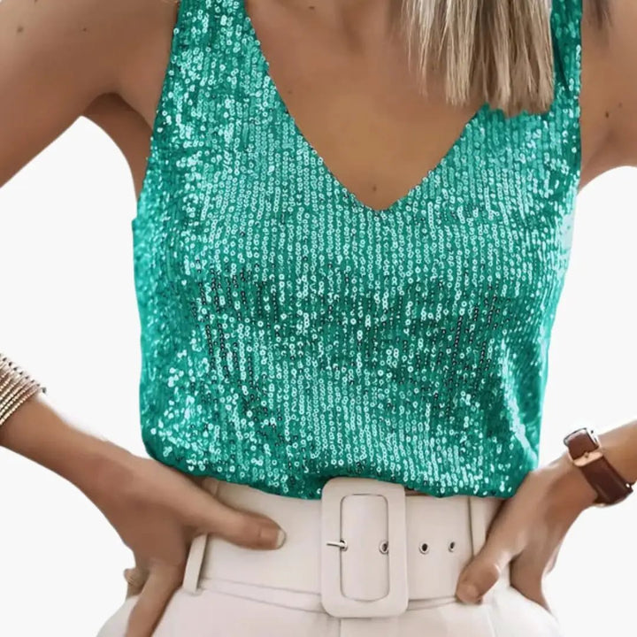 Stylish women's glittering sequin top, sleeveless, round neck, an elegant party fashion.