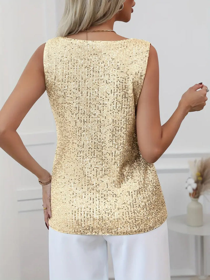 Shimmering women's long sleeve V-neck top, elegant festive and party attire.