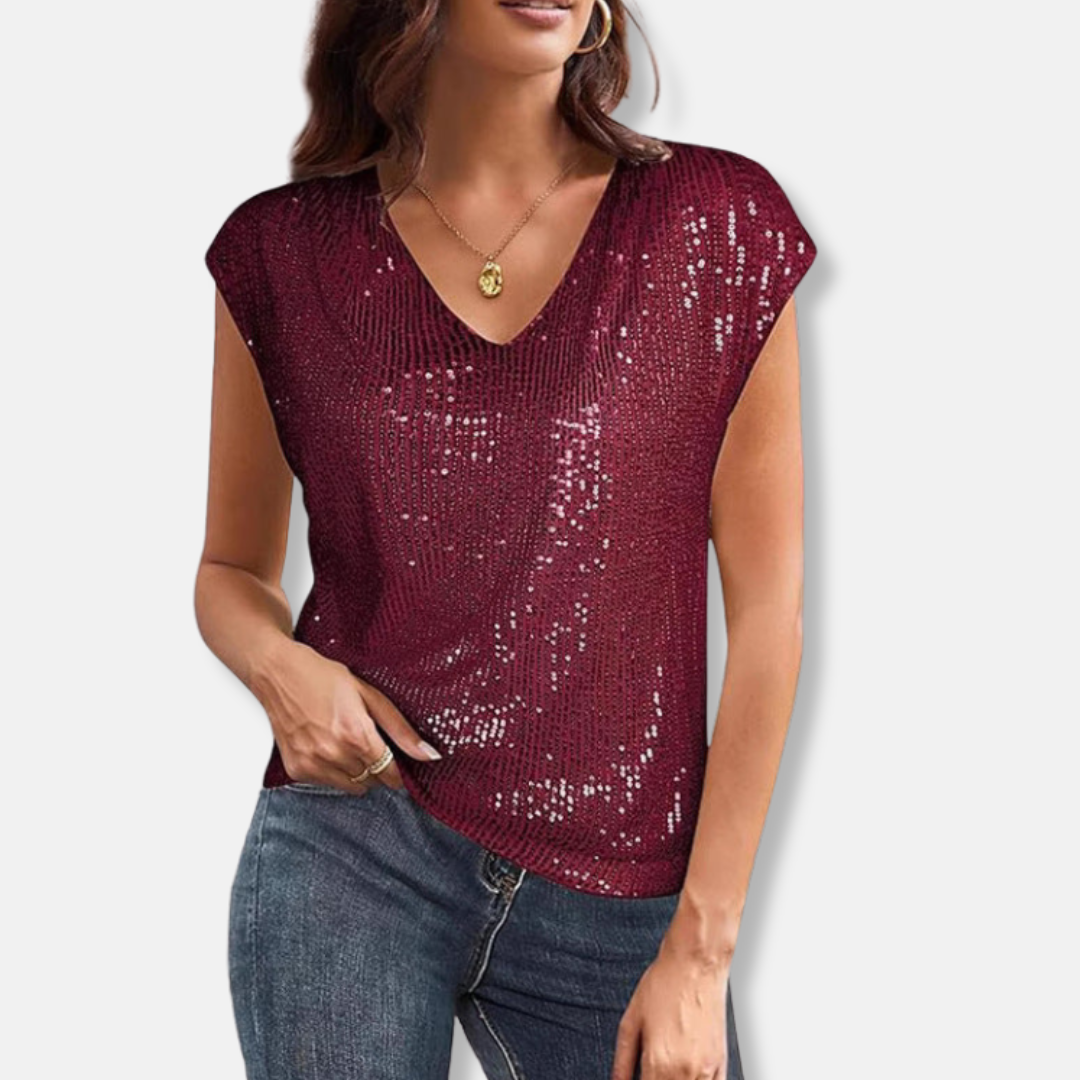 Versatile women's V-neck party blouse, shimmering & elegant. Short sleeve design makes it a perfect special occasion top.