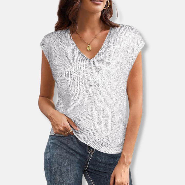 Sparkling silver V-neck women's party blouse, an elegant short sleeve top for evening wear & celebrations. Glamorous & festive.