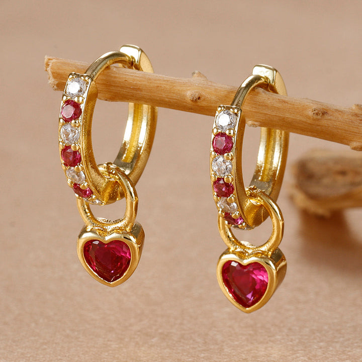 Versatile gold heart earrings with sparkling zircon, suitable for elegant everyday style.