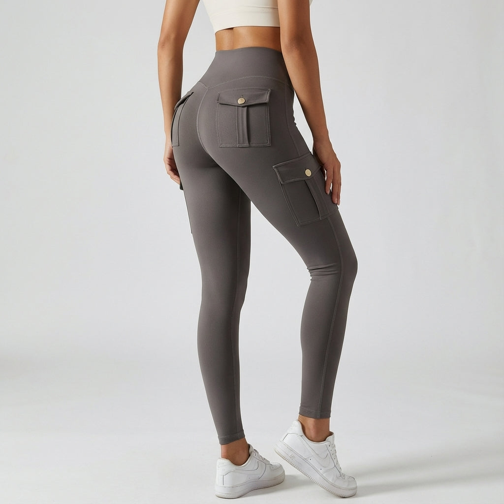 High-waisted stretch cargo leggings for women, ideal for yoga, fitness, and everyday athletic wear. Features pockets.