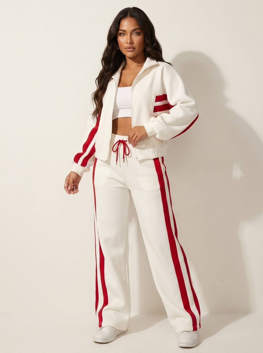 Women's zip-up track jacket with contrast stripes, part of a comfy two-piece athleisure set.