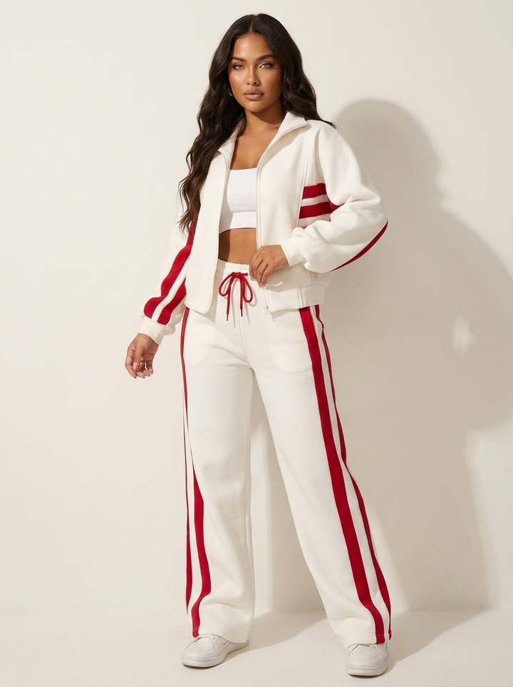 Women's zip-up track jacket with contrast stripes, part of a comfy two-piece athleisure set.