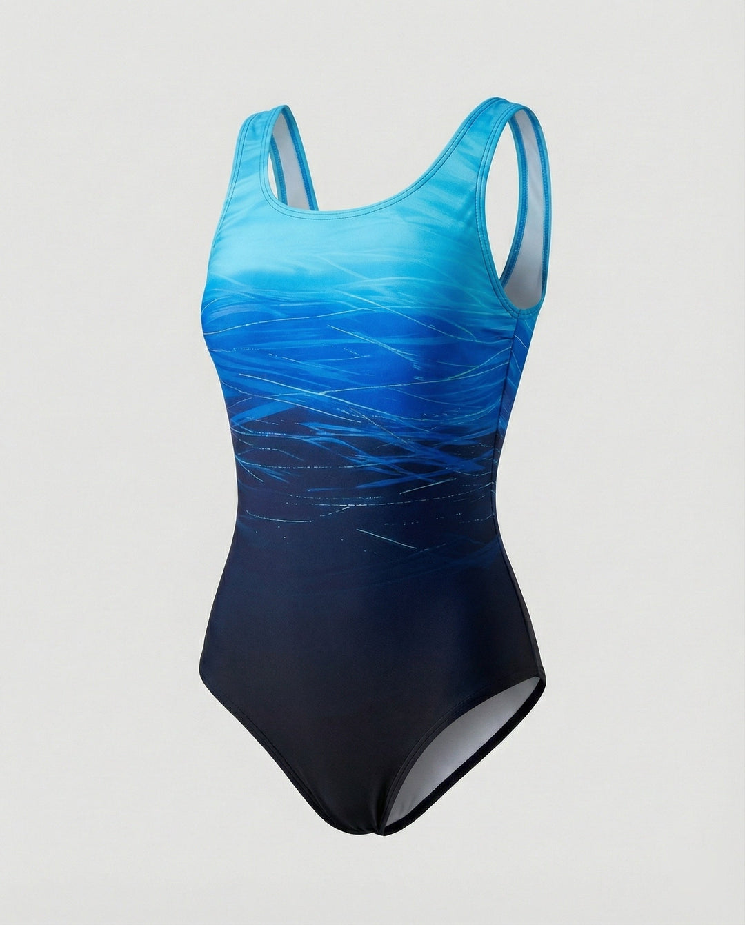 Vibrant ombre women's one-piece swimsuit, sporty and quick-dry, perfect for active beach days or poolside fun.
