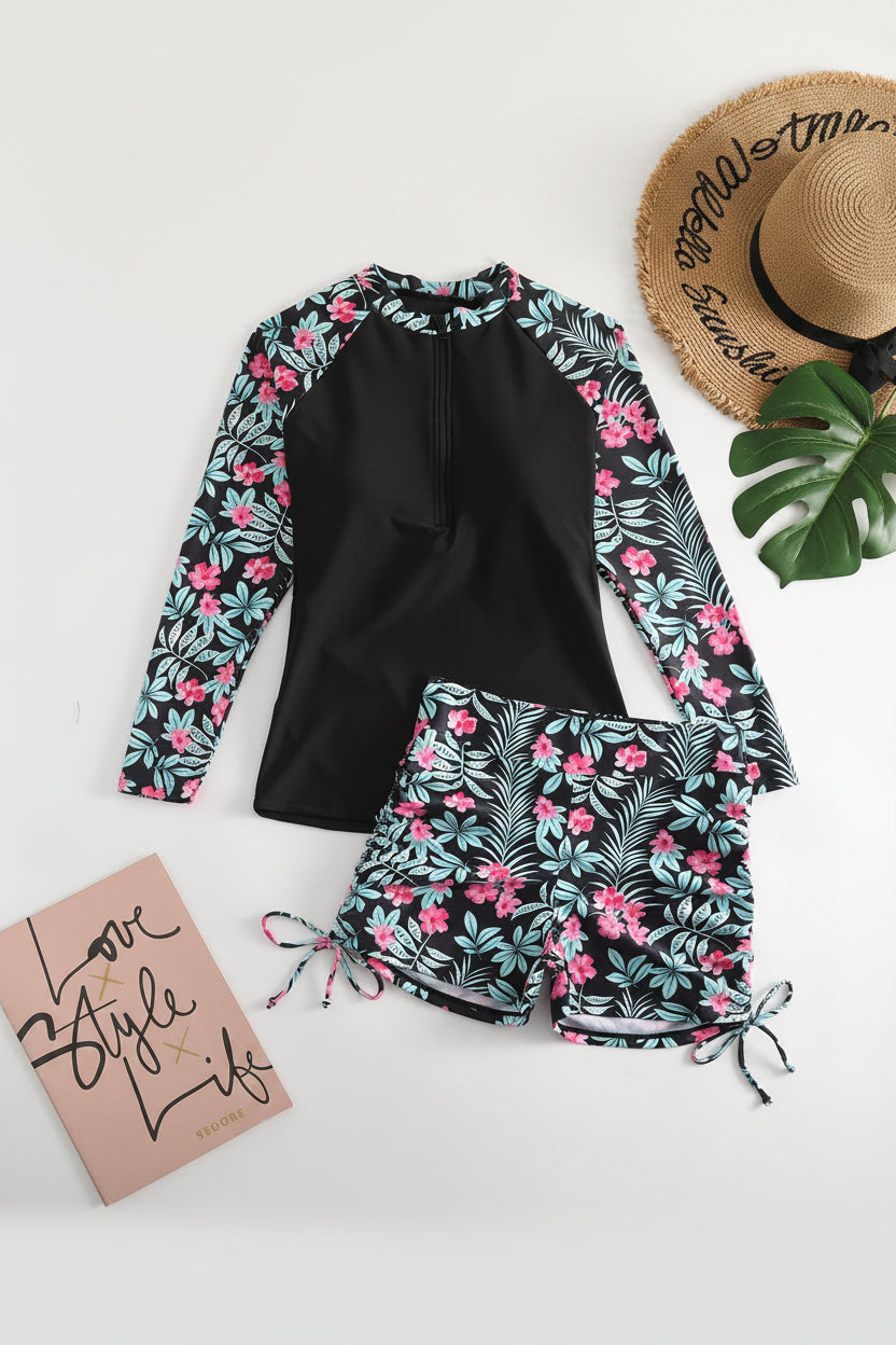 Stylish women's tropical rashguard swimsuit set, a perfect vacation outfit for beach days and resort wear.