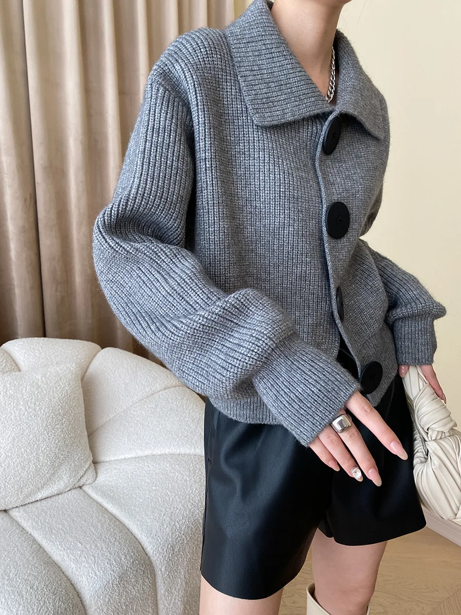 Women's button-down layering cardigan for casual chic autumn style with statement buttons.