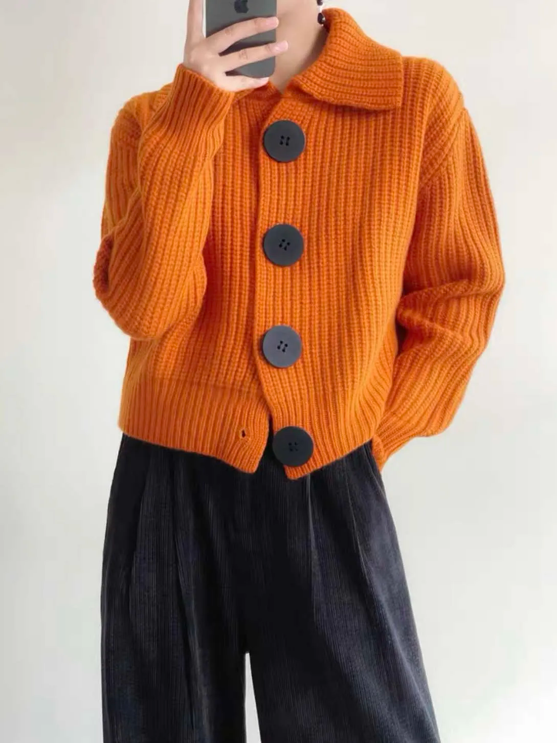 Casual chic women's button-down cardigan, an effortless layering piece with a wide collar.