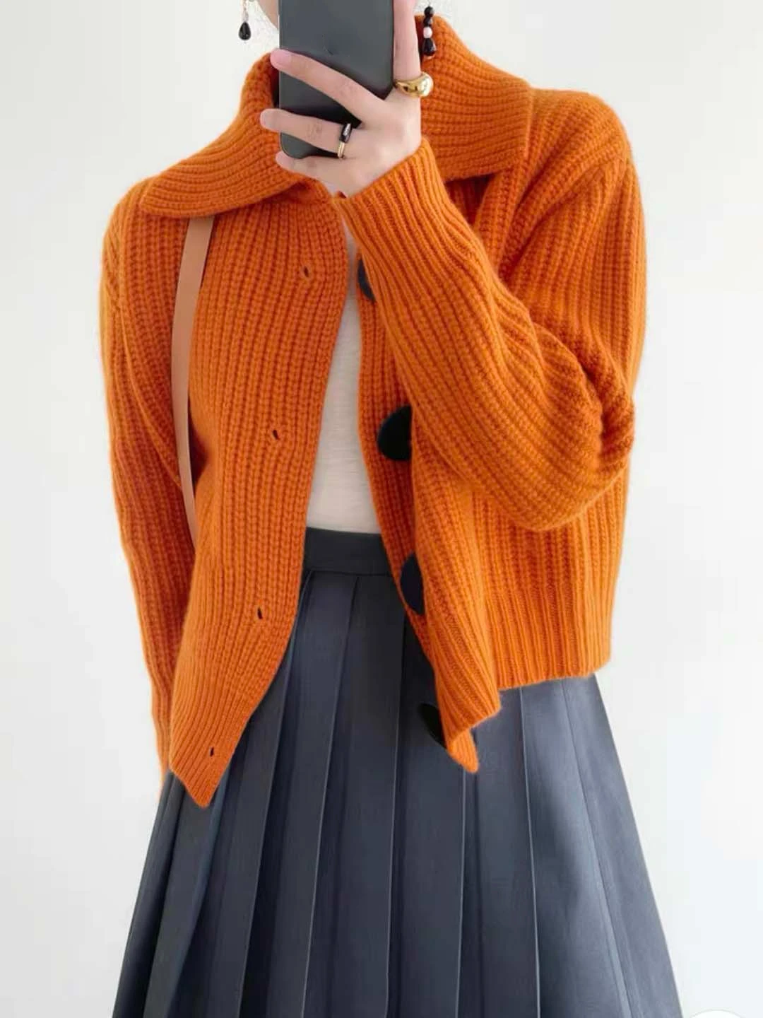 Versatile women's button-down cardigan, ideal fashion top for casual chic layering in autumn.