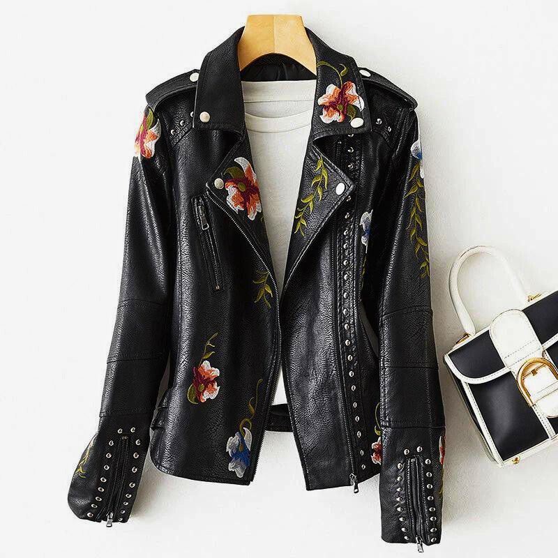 Unique women's statement jacket with detailed floral embroidery and striking studs for an edgy, fashion-forward look.