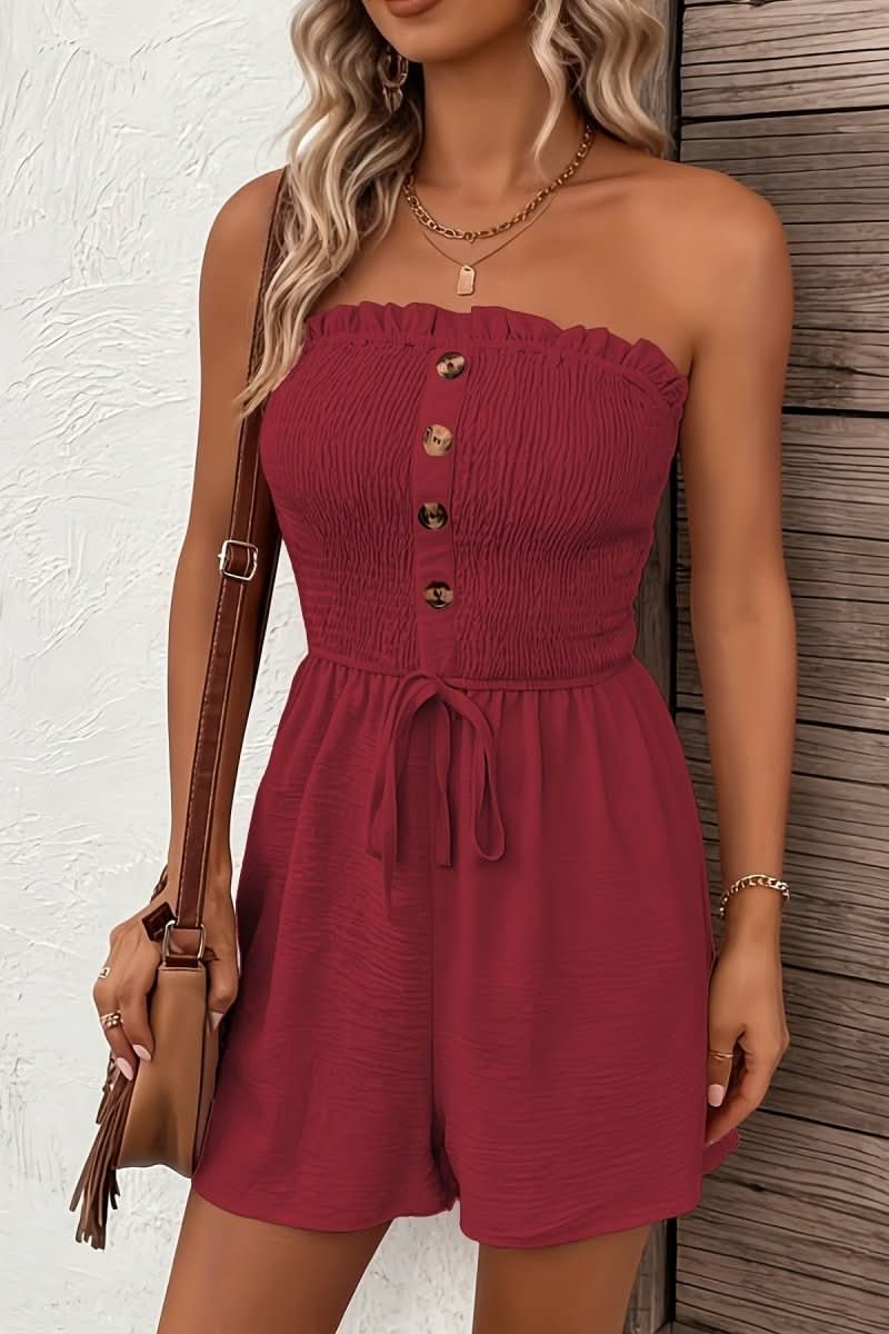 Chic strapless button-front romper for summer. Ideal for beach, vacation, or casual daytime. Lightweight comfort.