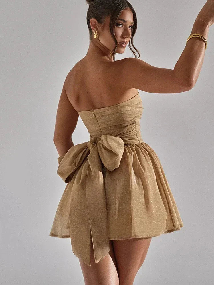 Glittering strapless skater mini dress for women. Ideal homecoming, cocktail, or party evening wear.