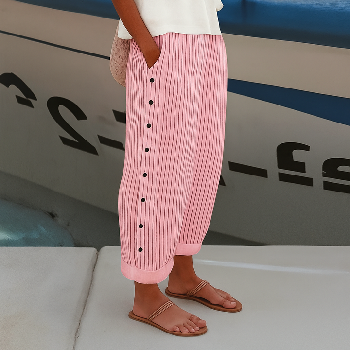 Versatile women's above-ankle stripe panel trousers with chic button detailing, ideal for elegant casual wear.