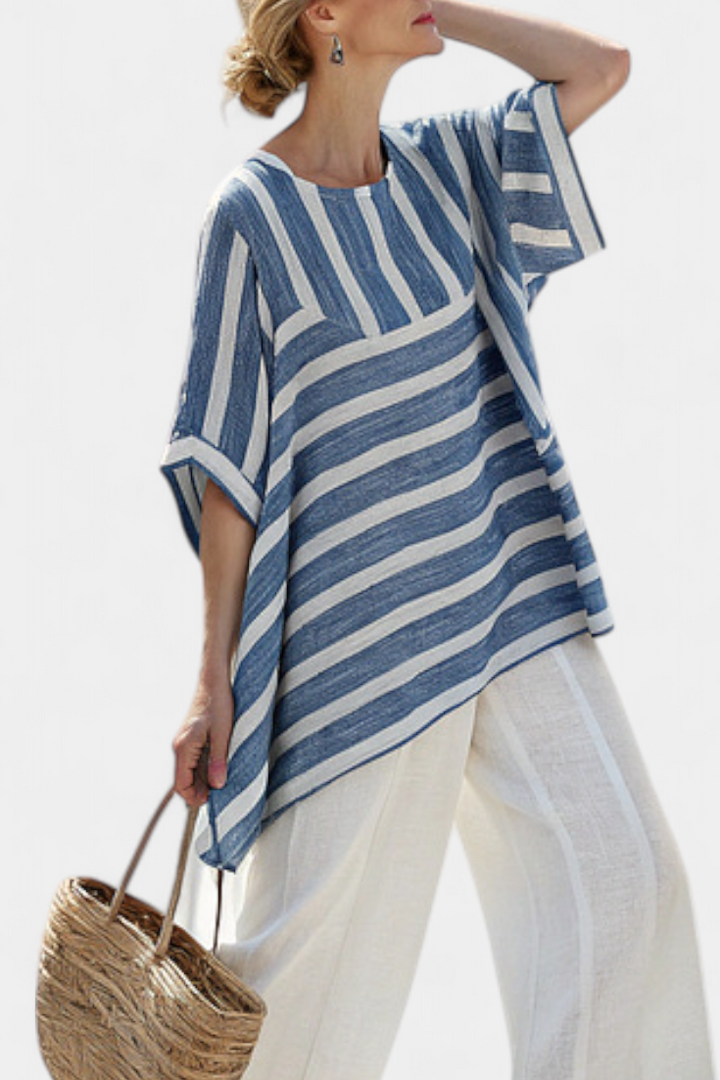 Stylish women's two-piece striped outfit with batwing top & wide leg pants, ideal for summer vacation.