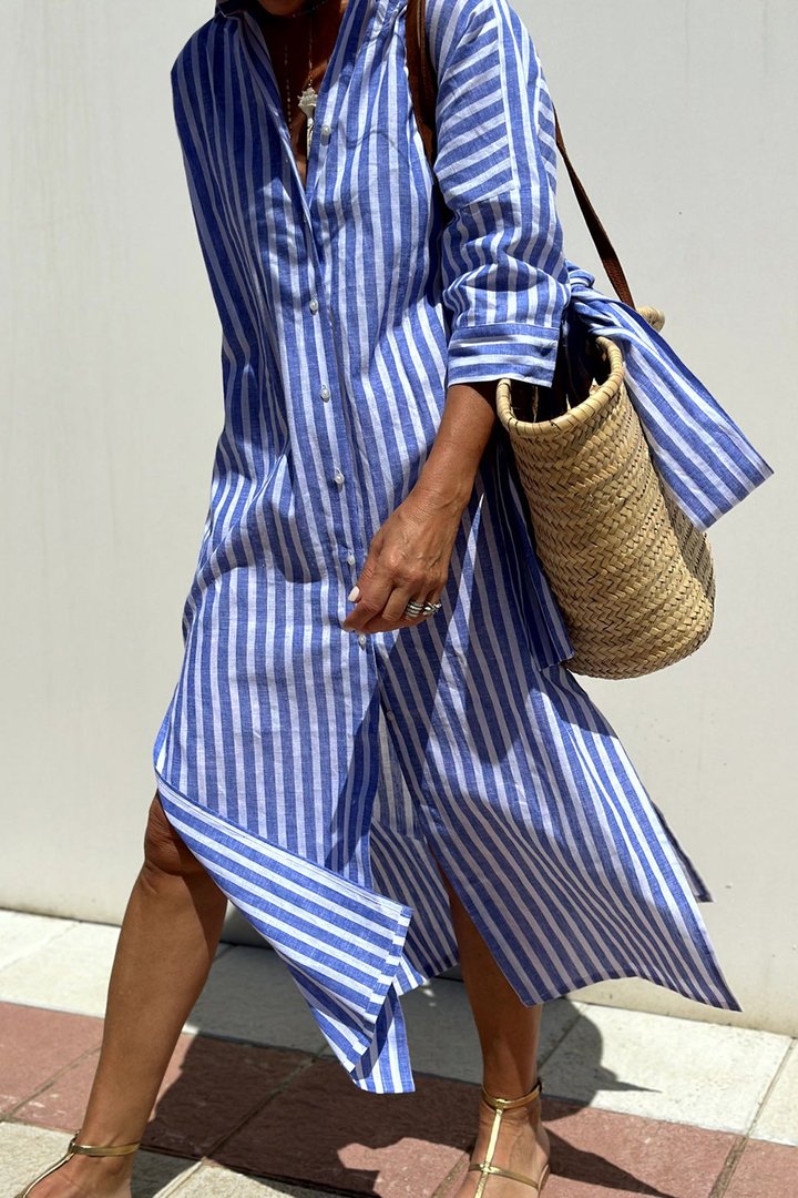 Comfortable women's oversized striped dress, a collared midi style ideal for a relaxed summer look.