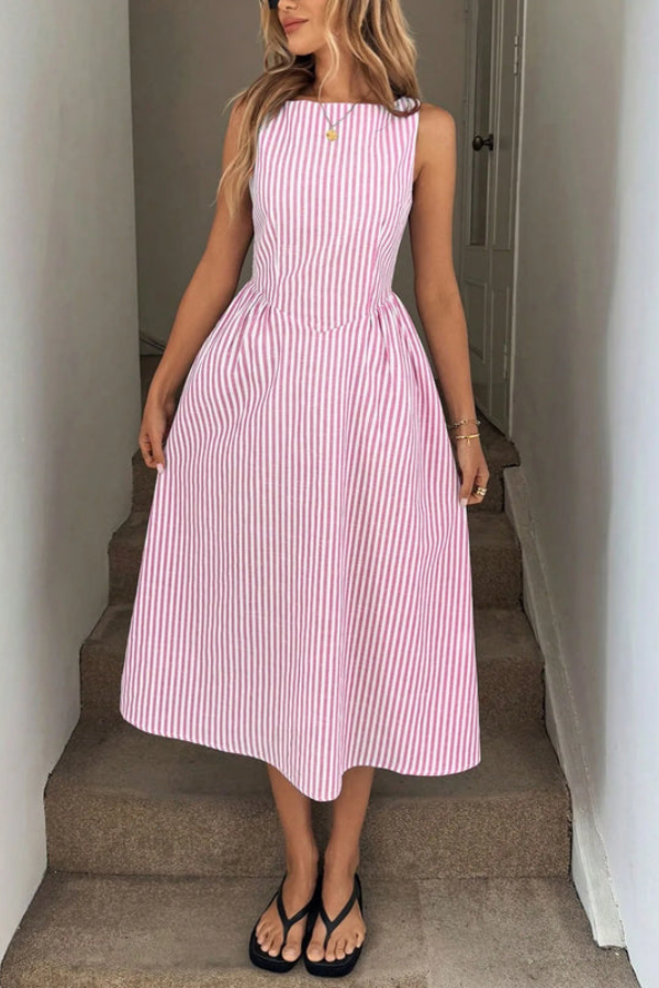 Casual yet elegant women's striped halter midi dress. Perfect summer vacation wear with a pleated skirt.