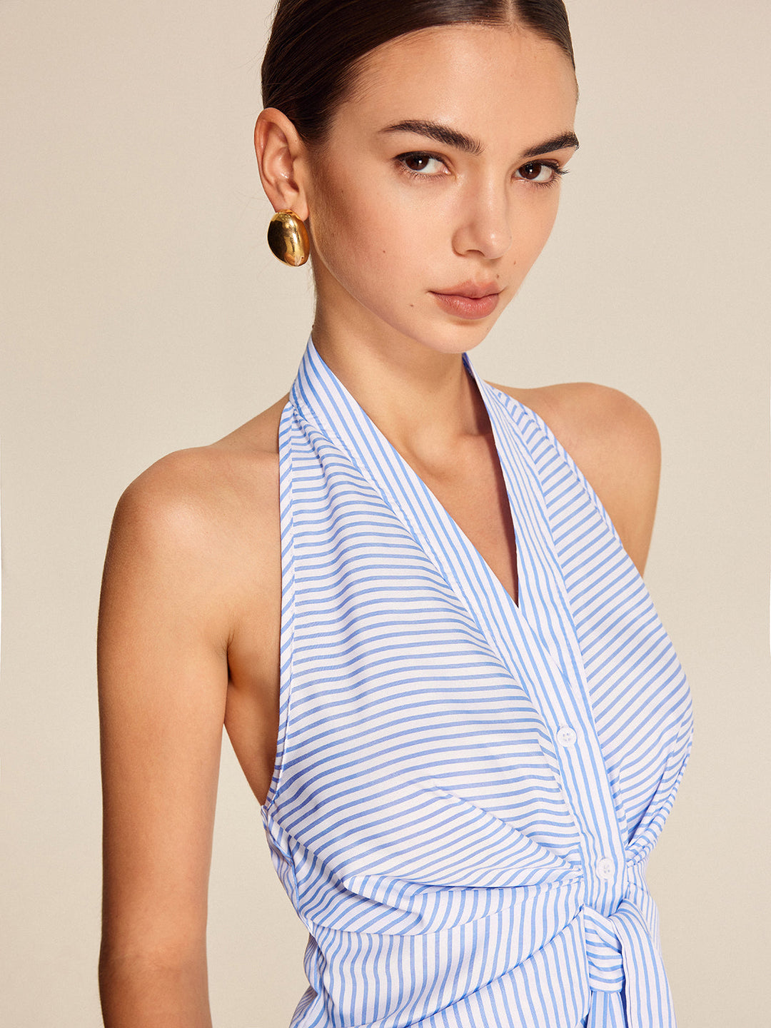 Casual yet professional women's striped halter top, sleeveless tie-front blouse for summer & work.