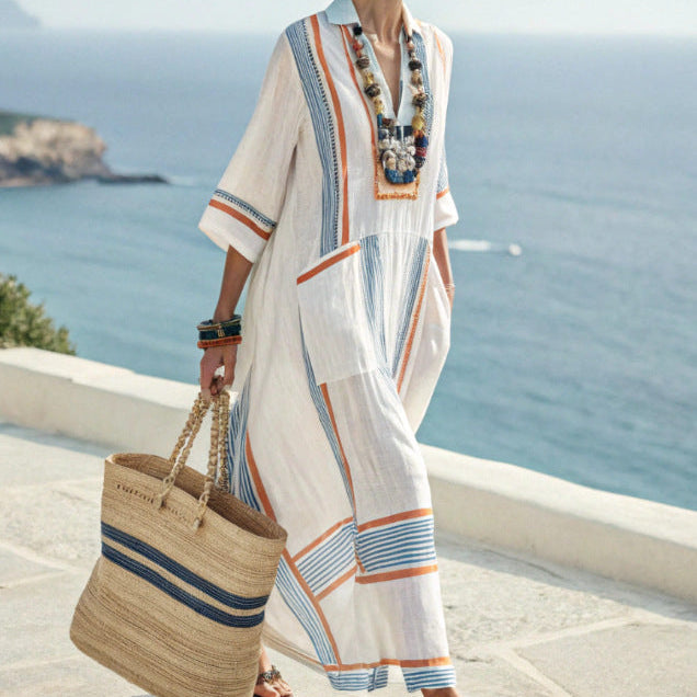 Women's striped kimono maxi dress for beach and resort wear, perfect flowy summer vacation outfit.