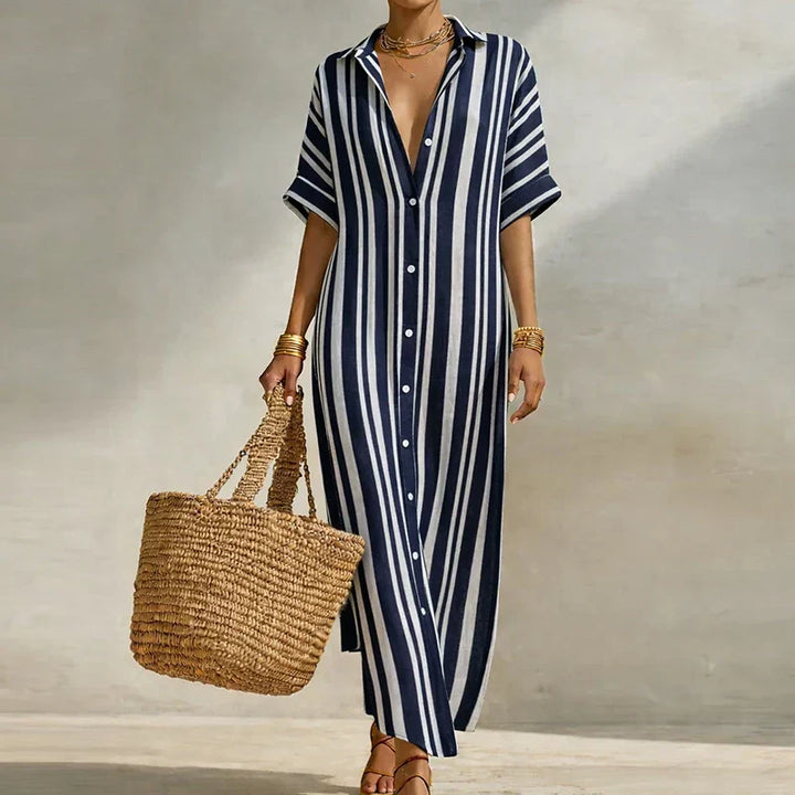Effortless women's long striped shirt dress. Comfortable V-neck and 3/4 sleeves, ideal for casual summer wear.