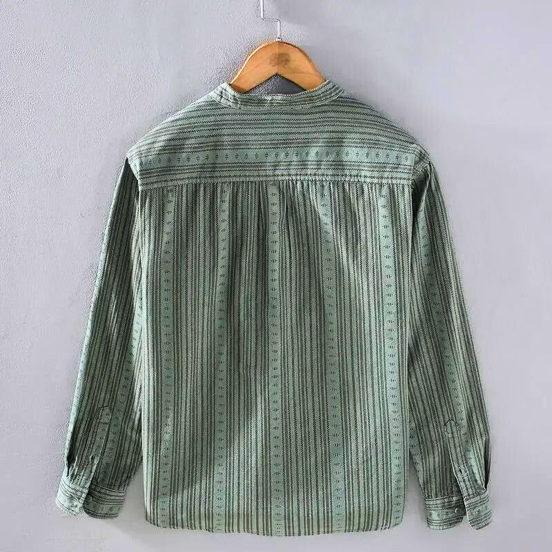 Comfortable women's relaxed fit striped casual shirt with long sleeves, ideal for everyday wear.