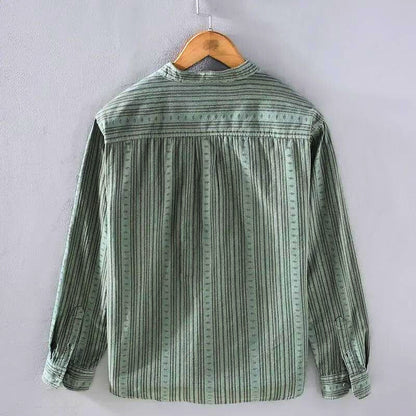 Comfortable women's relaxed fit striped casual shirt with long sleeves, ideal for everyday wear.