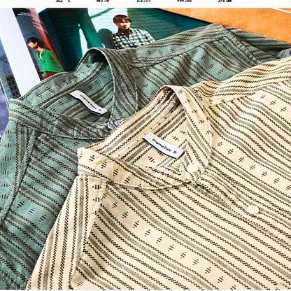 Women's long-sleeve striped shirt, relaxed fit for casual comfort, a stylish everyday button-up top.