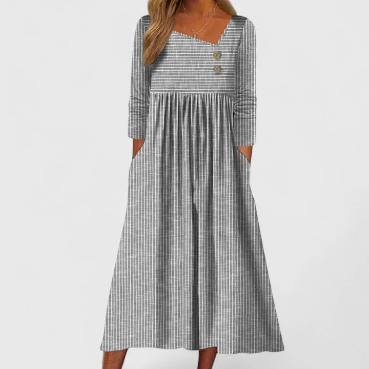 Women's striped long sleeve midi dress with stylish button detail, perfect for casual or elegant occasions.