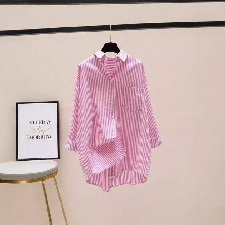 Longline women's striped button-down shirt, oversized fit with chest pocket. Ideal for versatile spring & summer fashion.