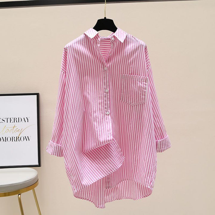 Crisp striped oversized button-down shirt for women, a casual chic top with dropped shoulders for effortless style.