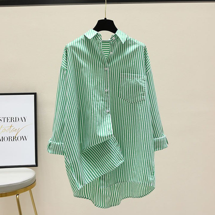 Front view of women's striped oversized button-down shirt, showing chest pocket & longline silhouette. Preppy and casual.