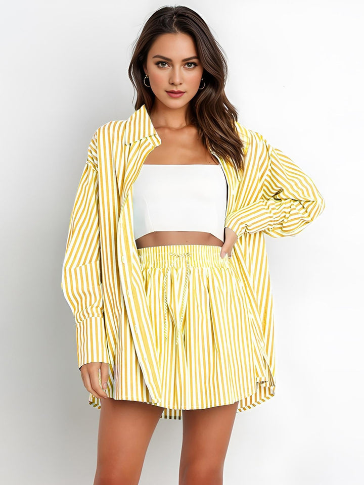 Women's striped oversized cotton poplin two-piece lounge set for casual summer fashion.
