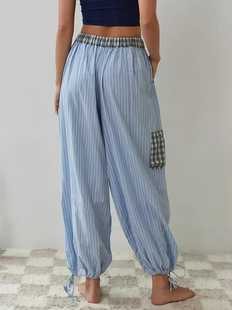 Soft women's striped plaid lounge set. Relaxed fit two-piece for spring/summer comfort and style.