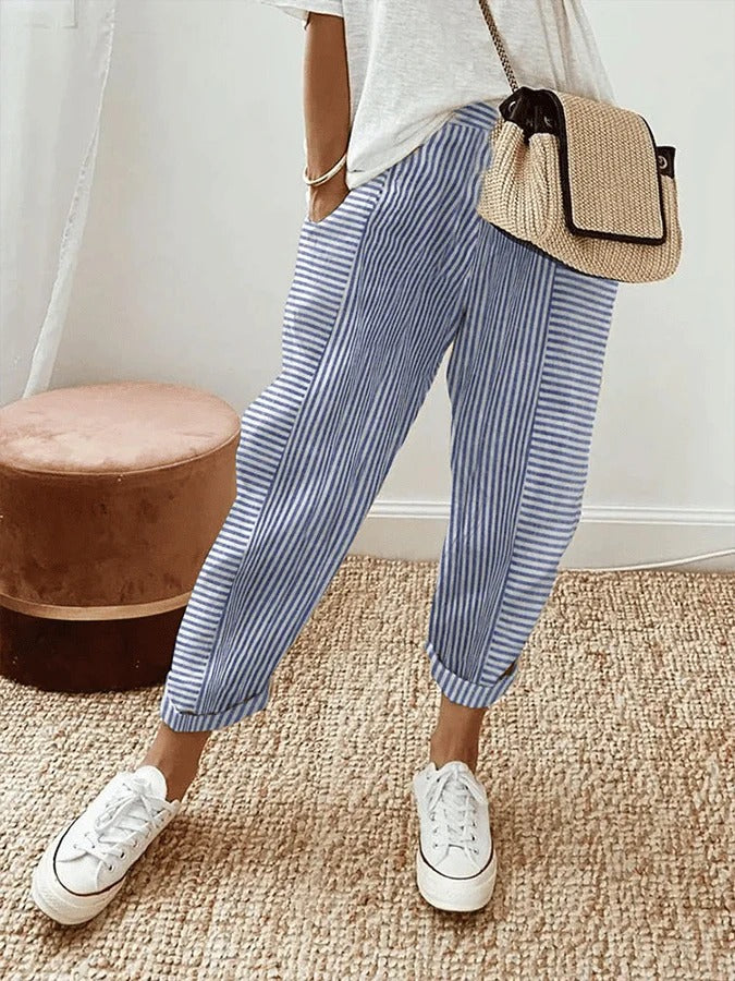 Versatile women's striped relaxed trousers, ideal for casual or smart casual outfits. Effortless style & comfort.