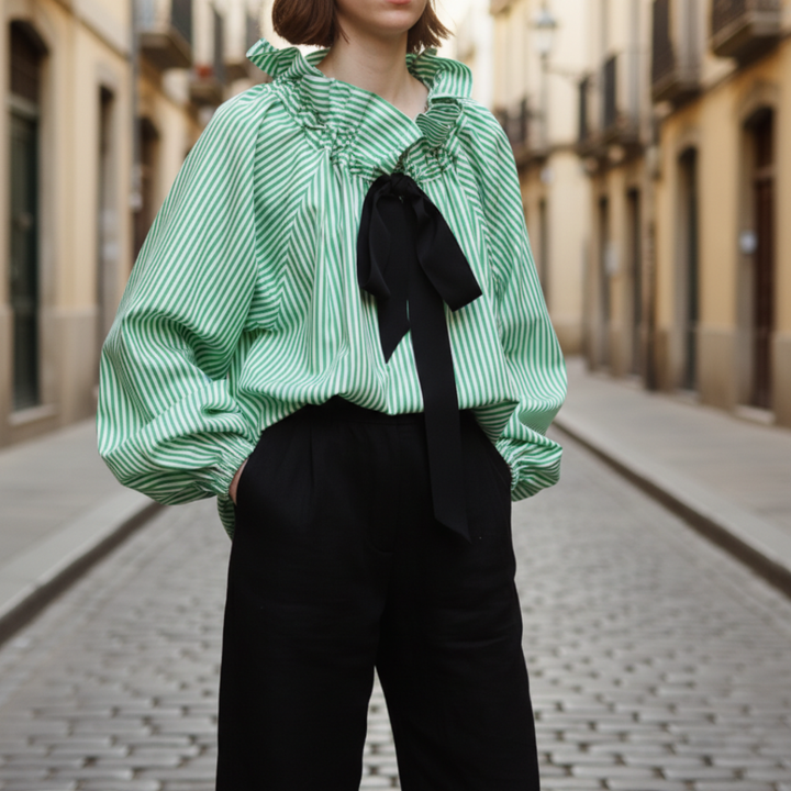 Women's striped ruffle blouse with chic bow tie detail, perfect for office wear & elegant style.