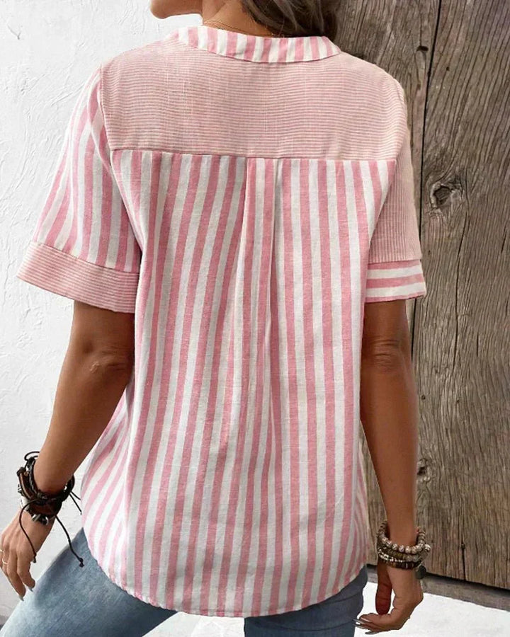 Striped short sleeve women's blouse, a stylish fashion top for summer and spring fashion trends.