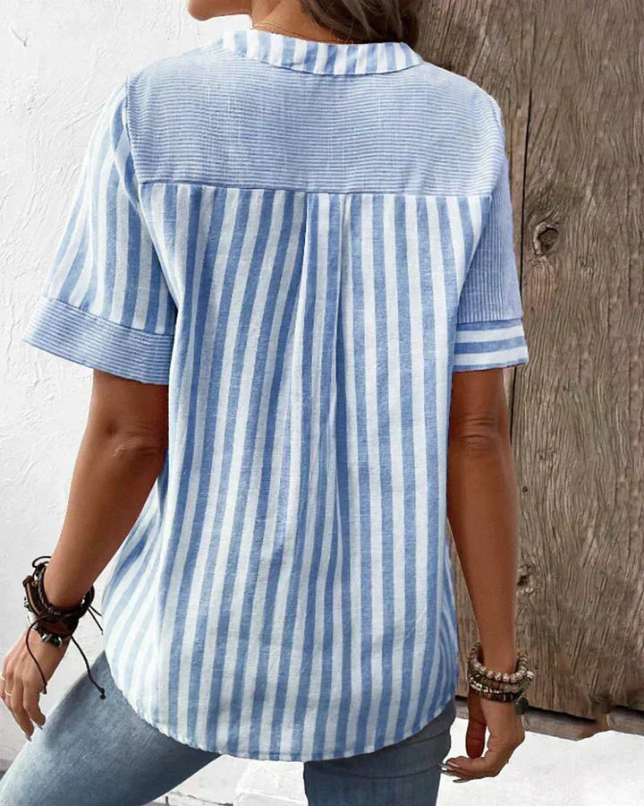 Fashionable women's striped short sleeve blouse, offering an elegant & effortless style for any occasion.