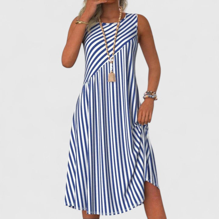 Women's striped sleeveless A-line midi dress. Effortless style, perfect for casual summer days & vacation outfits.