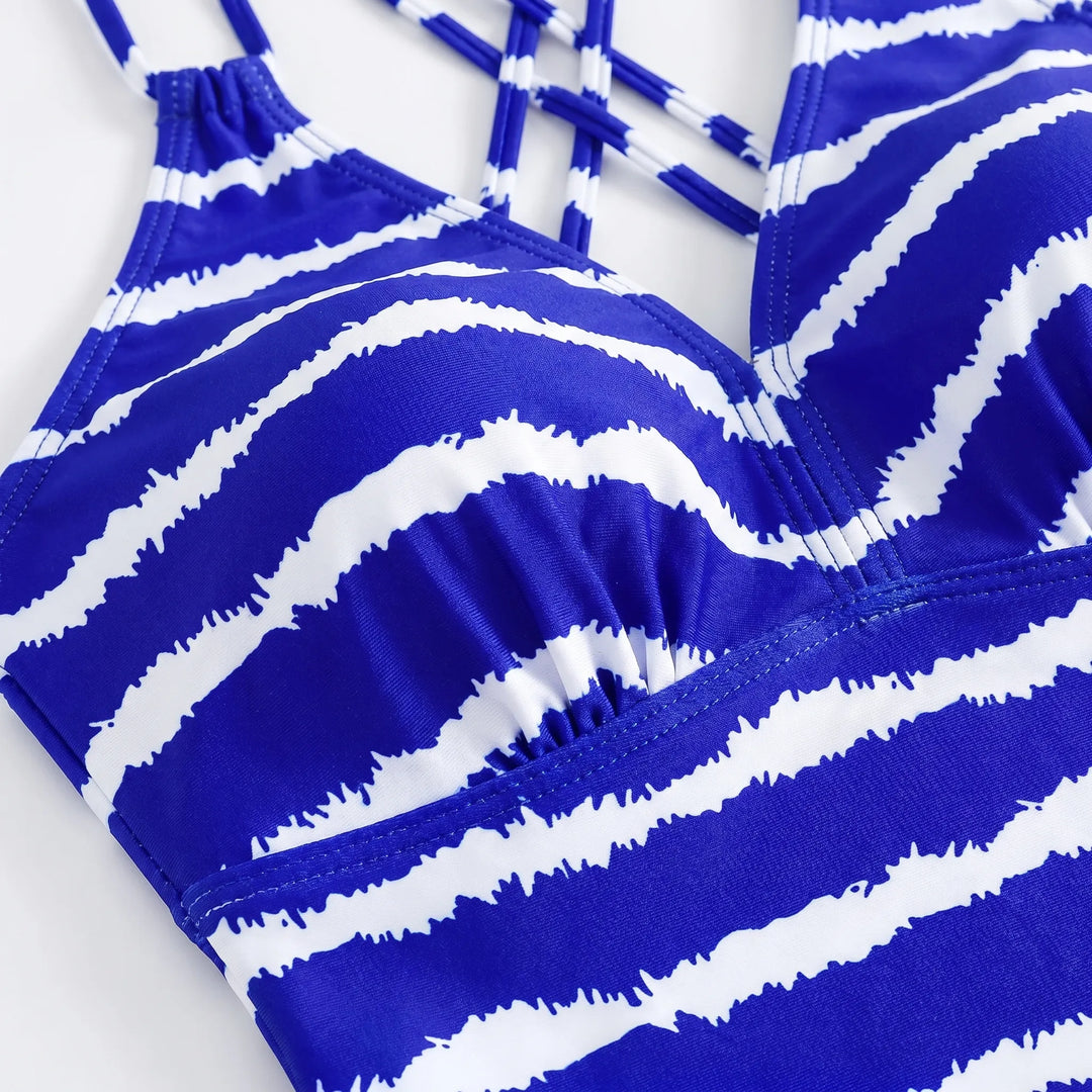 Comfortable women's striped tankini swimwear. Two-piece swimsuit for sunny days, perfect beachwear with adjustable straps.