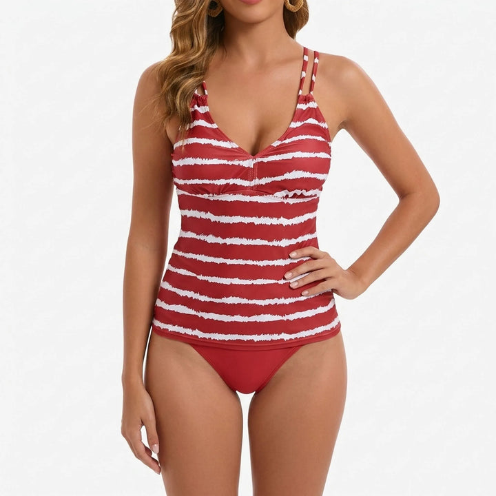 Woman wearing a striped tankini swimsuit set. Two-piece beachwear, perfect for summer vacation and sunny days.
