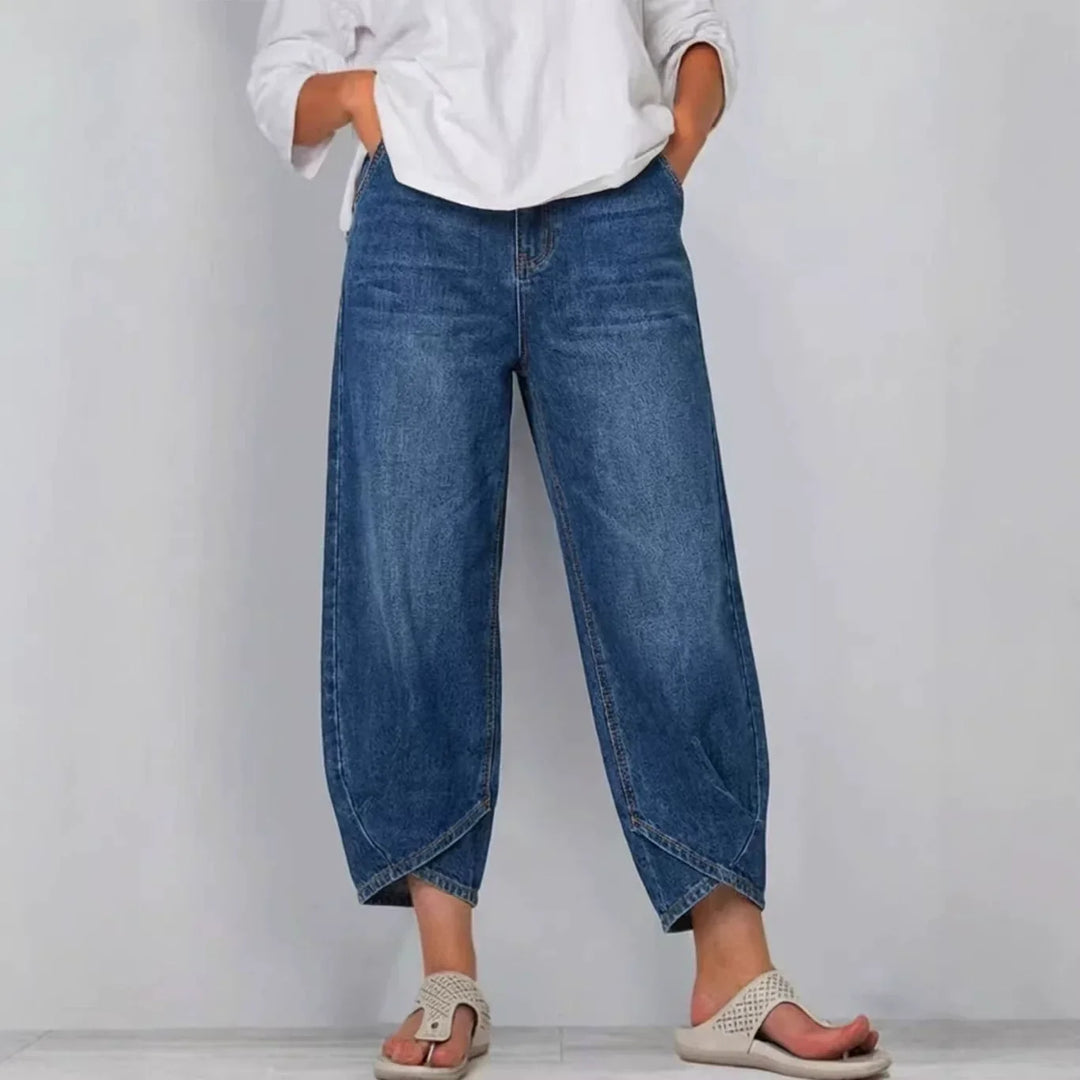 Women's stylish barrel leg cropped jeans in versatile denim for casual wear and modern fashion.