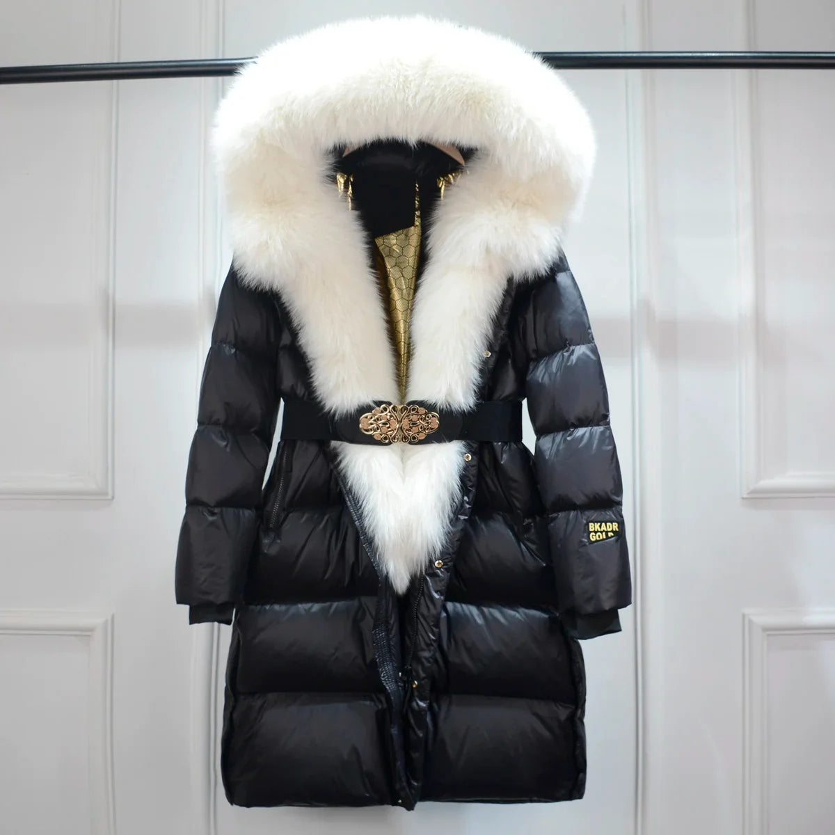 Cozy women's puffer coat with belt. A stylish & warm long jacket, perfect for daily casual winter outerwear.
