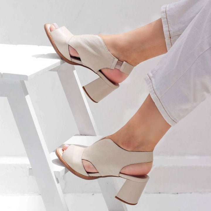 Women's stylish black block heel sandals for all-day comfort and elegant wear.