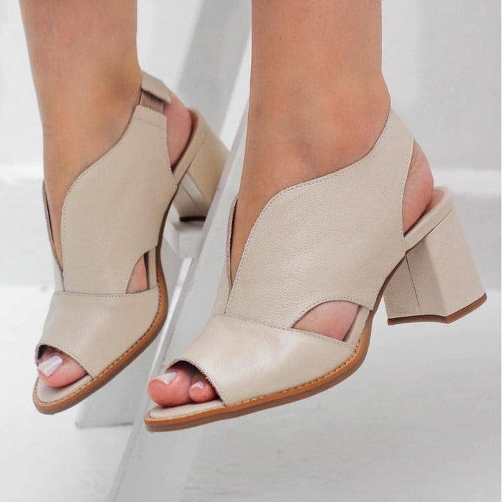 Women's open-toe block heel dress sandals, offering both style and enduring comfort.