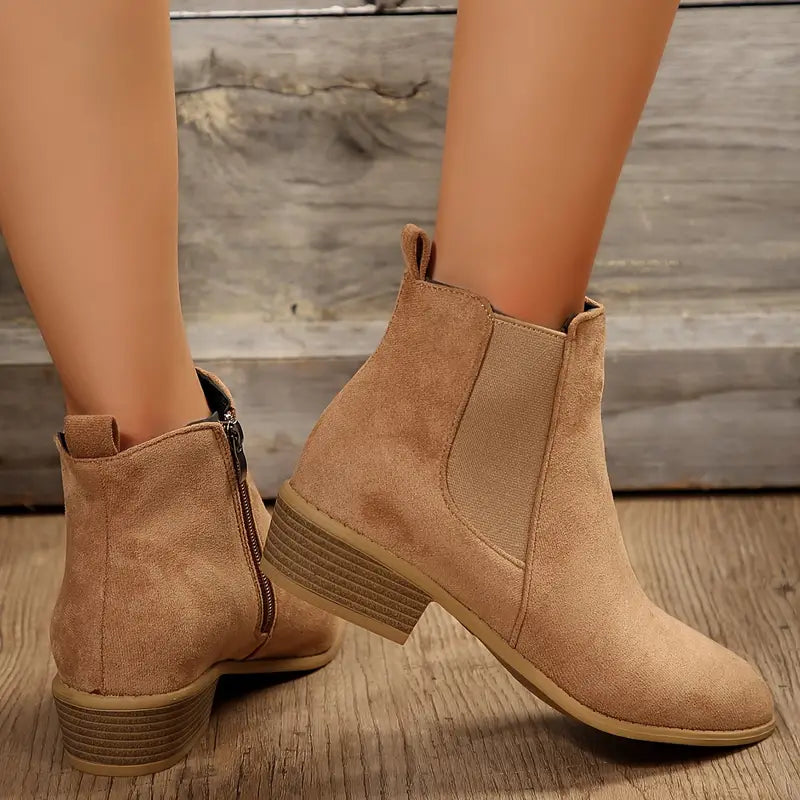 Stylish women's black Chelsea boots, pull-on design, ideal for comfortable everyday wear & fall fashion.