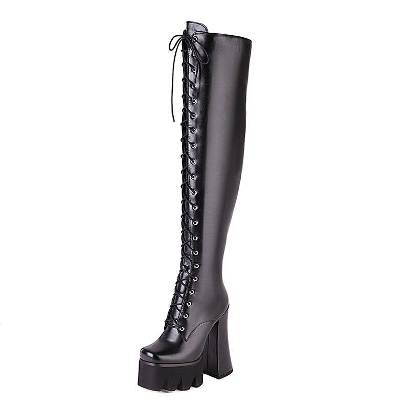 Women's stylish black platform knee boots for an edgy, fashionable look.