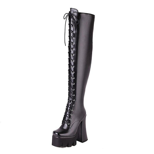 Women's stylish black platform knee boots for an edgy, fashionable look.