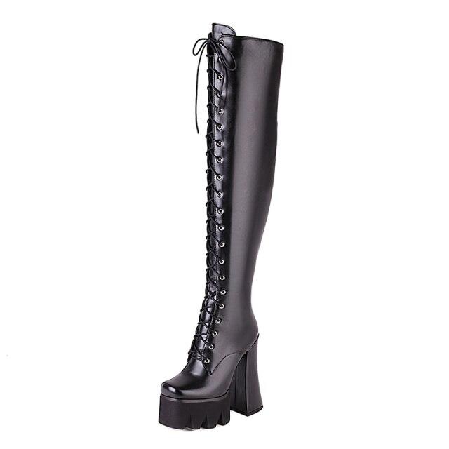 Stylish women's platform knee-high boots, perfect for an edgy fashion statement or party wear.