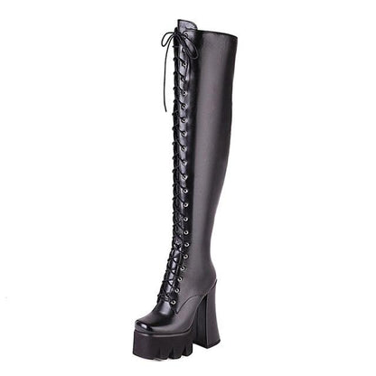 Stylish women's platform knee-high boots, perfect for an edgy fashion statement or party wear.