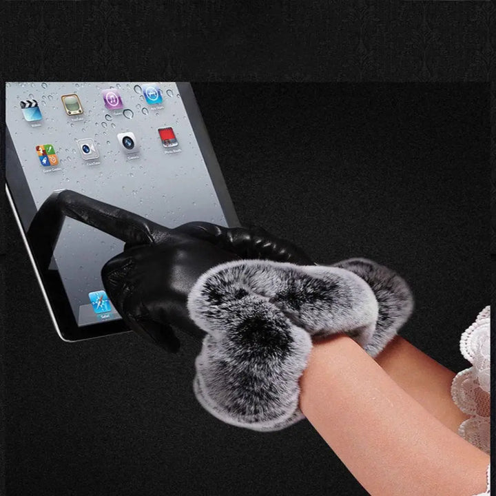Elegant women's cold weather gloves; black PU leather design with a plush faux fur cuff, very chic.