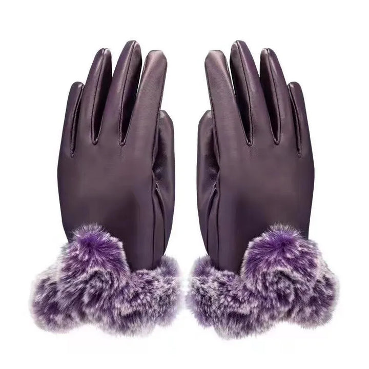 Fashionable women's PU leather gloves with a luxurious faux fur trim, providing warmth and elegance in winter.